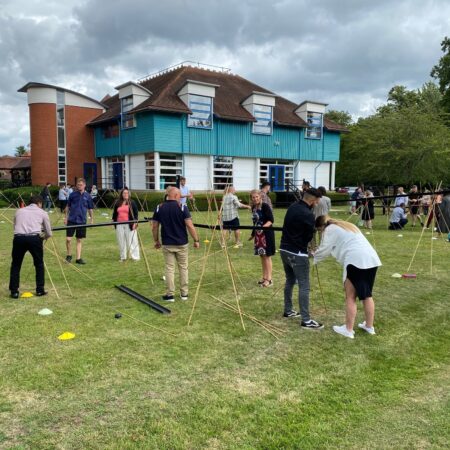 A group doing a leadership development activity at the cim business centre moor hall in maidenhead